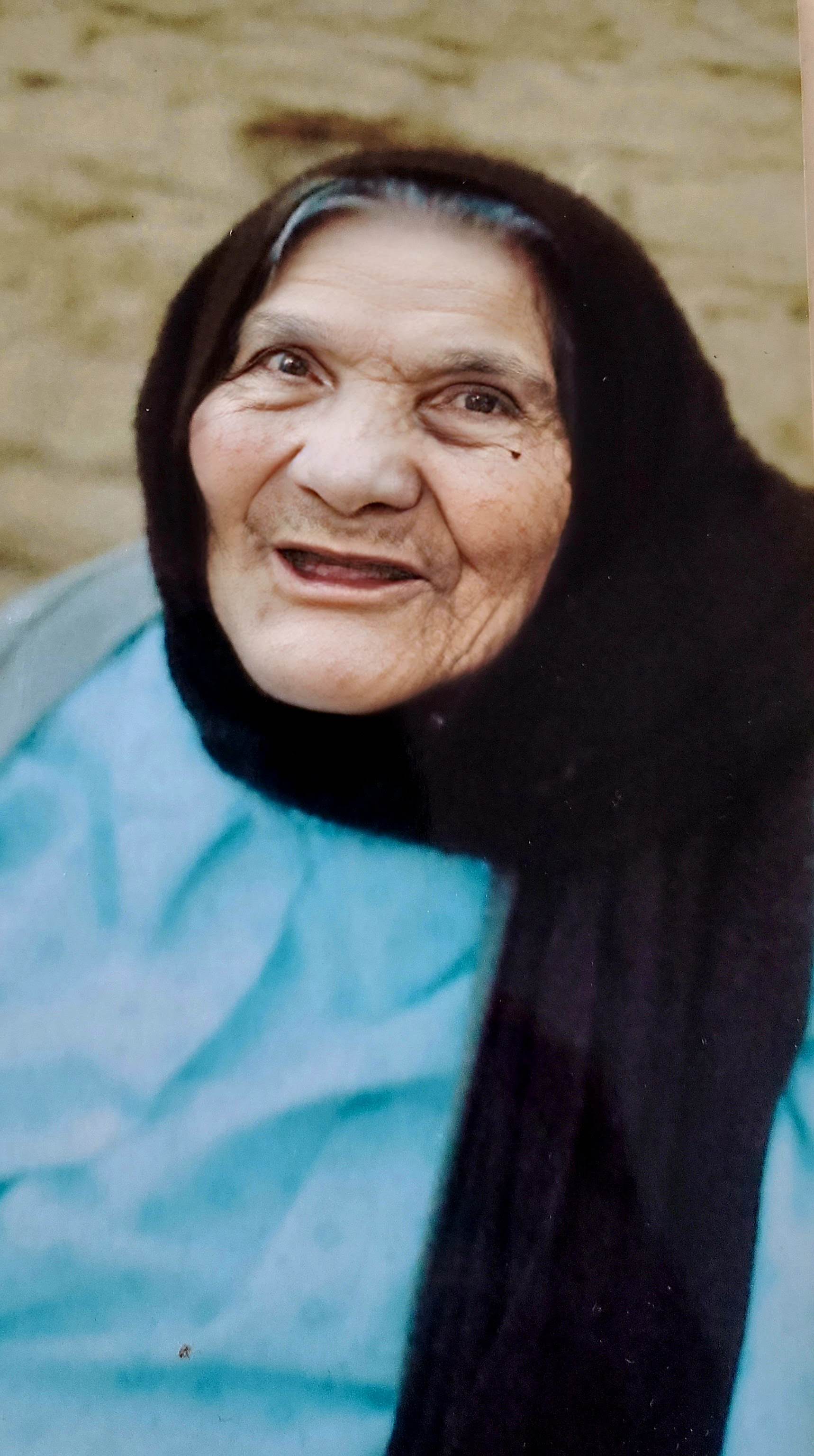 A photograph of Mónica Haydeé Ramos's grandmother wearing a black rebozo.